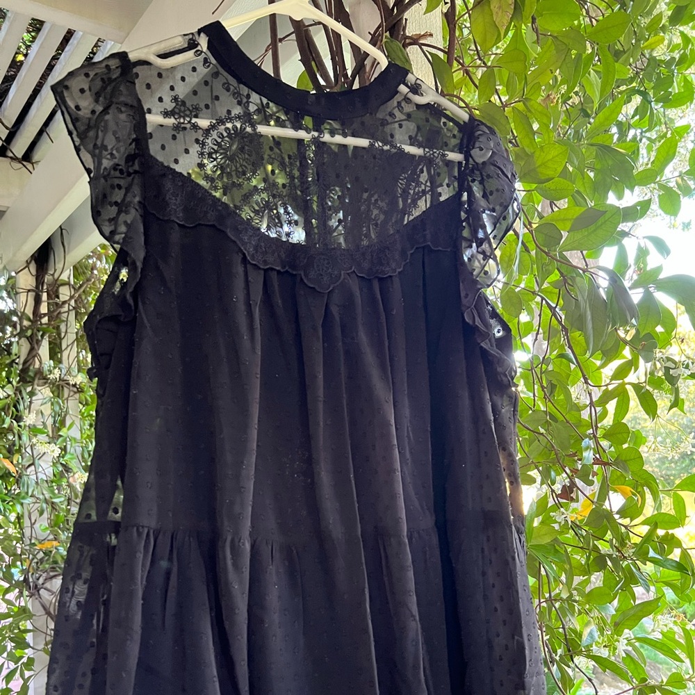 Black lace boutique shirt. Gently used.